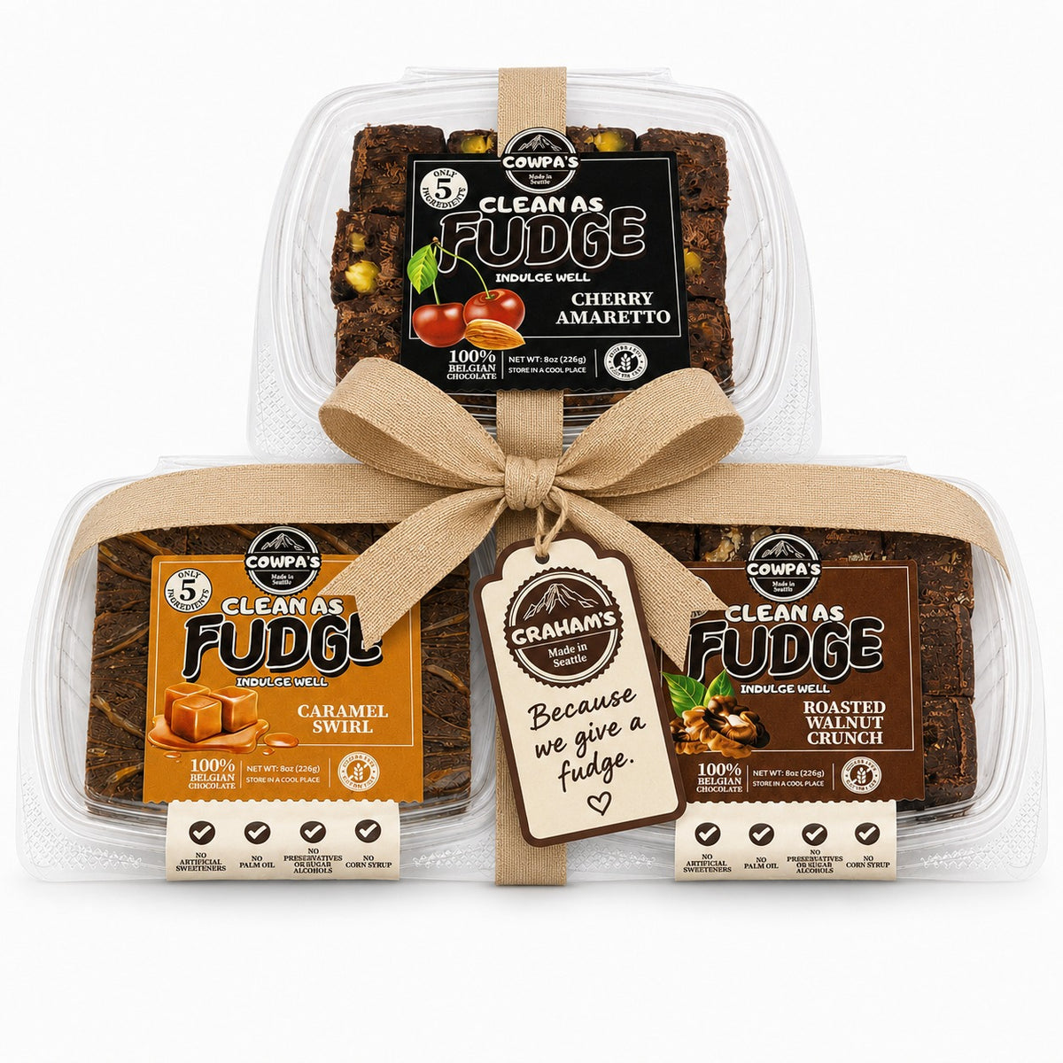 Three tubs of Clean as Fudge tied together with a ribbon and a Graham's gift tag